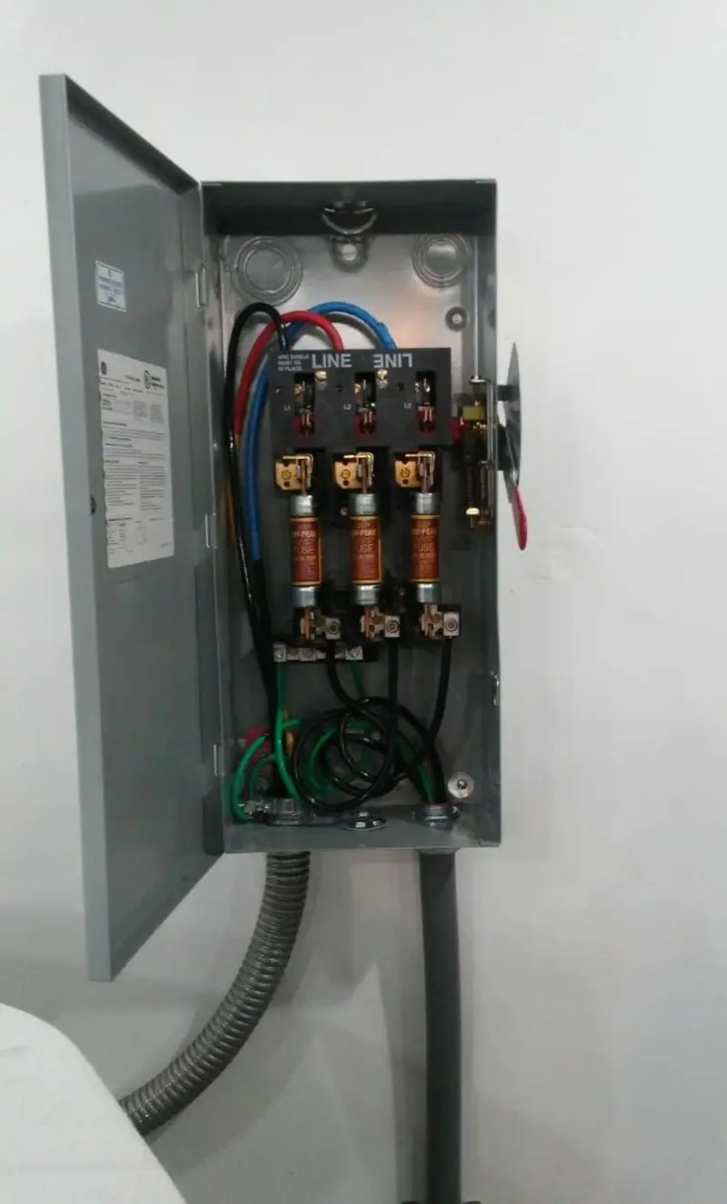 Three-phase disconnect switch installed for Smoke Detector Installation in Foster